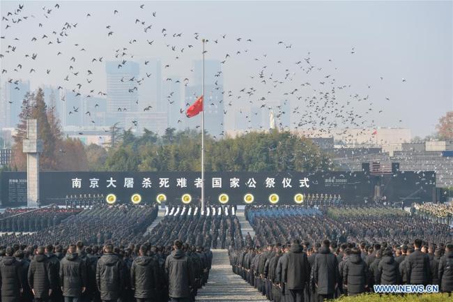 Photo taken on Dec. 13, 2018 shows the scene of the state memorial ceremony for China's National Memorial Day for Nanjing Massacre Victims at the memorial hall for the massacre victims in Nanjing, east China's Jiangsu Province. [Photo: Xinhua/Ji Chunpeng]