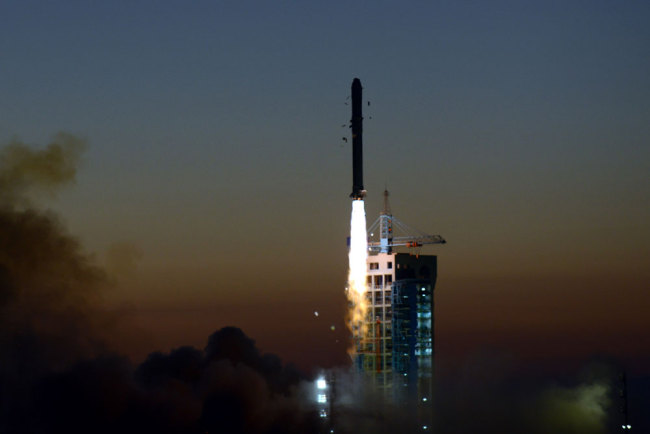 A Long March 2D (CZ-2D) carrier rocket loaded with China's first Dark Matter Particle Explorer satellite "Wukong" blasts off from the Jiuquan Satellite Launch Center near Jiuquan city, northwest Chinas Gansu province, 17 December 2015. [File Photo: IC]