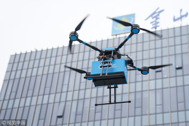 A drone delivers food for the takeaway food delivery company Ele.me in Shanghai on May 29, 2018. [File photo: VCG]
