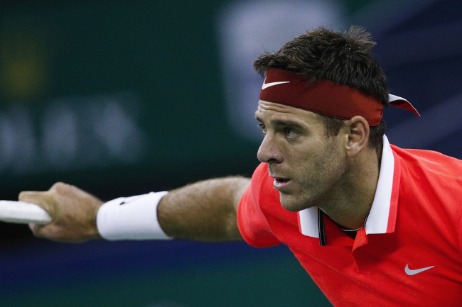 Juan Martin Del Potro of Argentina watches his shot as he plays against Borna Coric of Croatia in the men's singles match of the Shanghai Masters tennis tournament at Qizhong Forest Sports City Tennis Center in Shanghai, China, Thursday, Oct. 11, 2018. [Photo: AP]