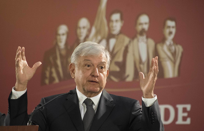 FILE - In this Dec. 3, 2018 file photo, Mexico's President Andres Manuel Lopez Obrador holds his first news conference as president, which started at 7 a.m. local time in Mexico City. Lopez Obrador has published a financial disclosure form on Thursday, Jan. 3, 2019, that reveals relatively few possessions and the fact that his wife makes more than he does. [Photo: AP/Christian Palma]