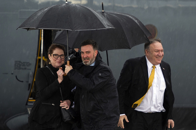 US Secretary of State Mike Pompeo, right, and his wife Susan disembark from their aircraft as they arrive in Erbil, Iraq, Wednesday, Jan. 9, 2019. [Photo: Pool via AP/Andrew Caballero-Reynolds]