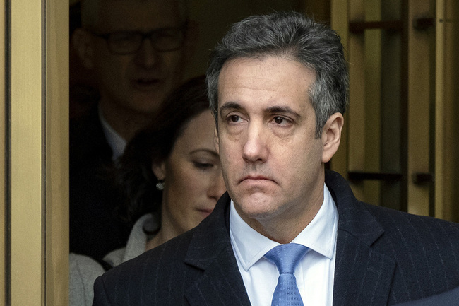 Michael Cohen, President Donald Trump's former lawyer, leaves federal court after his sentencing in New York, Wednesday, Dec. 12, 2018. Cohen was sentenced Wednesday to three years in prison for an array of crimes that included arranging the payment of hush money to two women that he says was done at the direction of Trump. [File photo: AP]