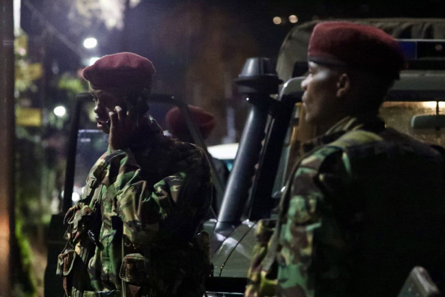 Kenyan soldiers stand outside the DusitD2 Hotel which was attacked on Tuesday, January 15, 2019, in Nairobi, capital city of Kenya. [Photo: China Plus/Xing Yihang]