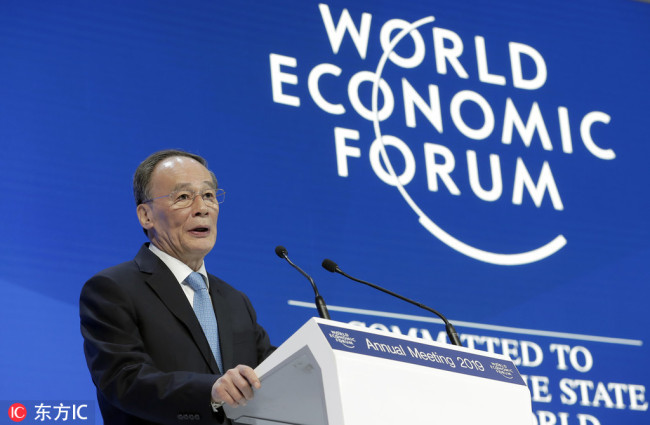 Chinese Vice President Wang Qisan addresses the annual meeting of the World Economic Forum in Davos, Switzerland, Wednesday, Jan. 23, 2019. [Photo: IC]