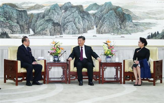 Xi Jinping (C), general secretary of the Communist Party of China (CPC) Central Committee and Chinese president, and his wife Peng Liyuan meet with Ri Su Yong, a member of the Political Bureau of the Workers' Party of Korea (WPK) Central Committee, vice-chairman of the WPK Central Committee and director of the party's International Department, who led an art troupe from the Democratic People's Republic of Korea (DPRK), in Beijing, capital of China, Jan. 27, 2019.[Photo:Xinhua] 