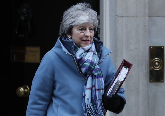 Britain's Prime Minister Theresa May leaves 10 Downing Street for the House of Commons for her weekly Prime Minister's Questions in London, Wednesday, Jan. 30, 2019. [Photo: AP/Alastair Grant]