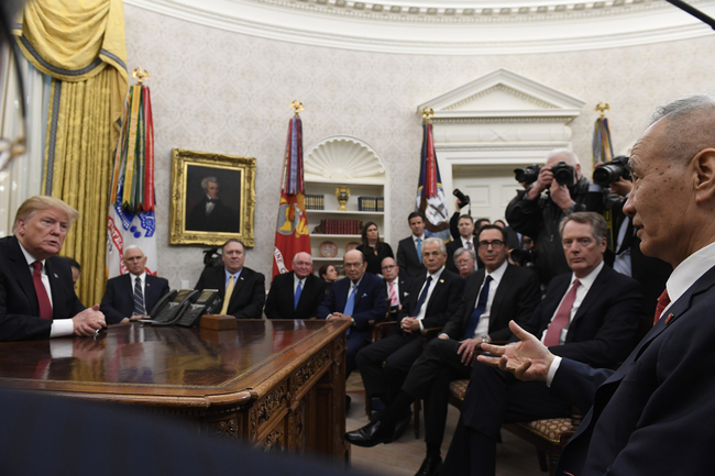 U.S. President Donald Trump, left, holds a meeting with Chinese Vice Premier Liu He, right, in the Oval Office of the White House in Washington, Thursday, Jan. 31, 2019. Also attending the meeting, starting third from left seated, are, U.S. Vice President Mike Pence, Secretary of State Mike Pompeo, Agriculture Secretary Sonny Purdue, Commerce Secretary Wilbur Ross, White House economic adviser Larry Kudlow, White House trade adviser Peter Navarro, national security adviser John Bolton, Treasury Secretary Steven Mnuchin, and U.S. Trade Representative Robert Lighthizer. [Photo: AP/Susan Walsh]