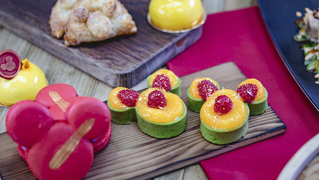 This undated photo provided by Disneyland Resort shows Mickey Mouse-shaped mandarin orange-green tea tarts from the Lucky 8 Lantern marketplace at Disney California Adventure Park in Anaheim, Calif. [Photo: AP]