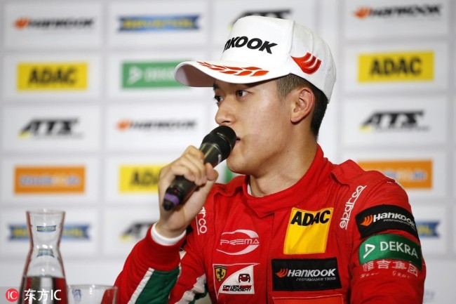 Zhou Guanyu speaks after taking the third place in  Formula 3 European Championship's race in Norisring, Germany on July 2, 2017. [Photo: IC]