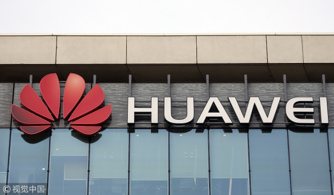 The logo of China's Huawei Information and Communication Technology Group is visible on the facade of its headquarters on January 31, 2019 in Paris, France. [Photo: VCG]