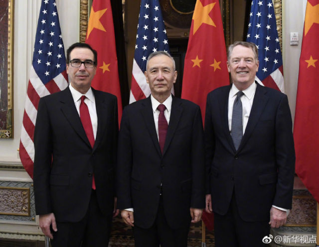 Chinese Vice Premier Liu He (C), U.S. Trade Representative Robert Lighthizer (R) and Treasury Secretary Steven Mnuchin pose for a photo as they open the seventh round of trade talks at the White House Eisenhower Executive Office Building in Washington on Thursday, February 21, 2019. [Photo: Xinhua]