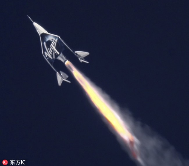 A handout made available by Virgin Galactic shows the Virgin Galactic spaceship VSS Unity after release from the WhiteKnightTwo launch vehicle as it heads towards spaced over the Virgin Galactic facility in Mojave, California, USA, February 22, 2019. [Photo: Virgin Galactic/EPA via IC]