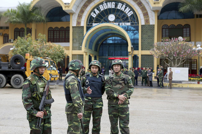 Vietnamese soldiers stand guard at the entrance to Dong Dang train station where North Korean leader Kim Jong Un is expected to arrive at the border town with China, in Dong Dang, Lang Son province, Vietnam, Monday, Feb. 25, 2019. The second summit between U.S. President Donald Trump and North Korean leader Kim Jong Un will take place in Hanoi on Feb. 27 and 28. [Photo: AP/Minh Hoang]