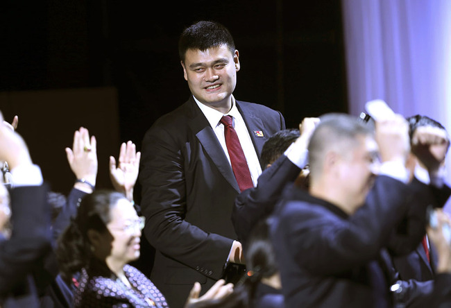 Yao Ming celebrates with Chinese participants after China was awarded the 2019 FIBA Basketball World Cup defeating the Philippines during a 2019 FIBA Basketball World Cup host announcement ceremony in Tokyo, Friday, Aug. 7, 2015. [Photo: AP] 