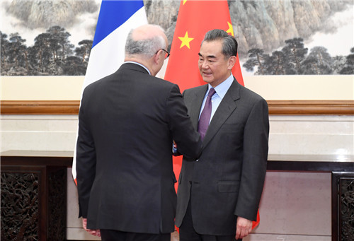 Chinese State Councilor and Foreign Minister Wang Yi meets with diplomatic adviser to French President Philippe Etienne in Beijing, on February 28, 2019. [Photo: fmprc.gov.cn]