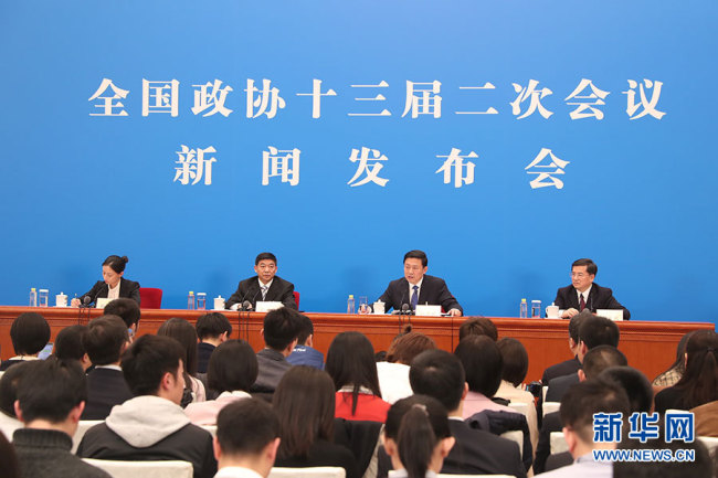 Guo Weimin (R2), spokesperson for the second session of the 13th National Committee of Chinese People's Political Consultative Conference (CPPCC), speaks during a press conference at the Great Hall of the People in Beijing, on Saturday, March 2, 2019. [Photo: Xinhua]