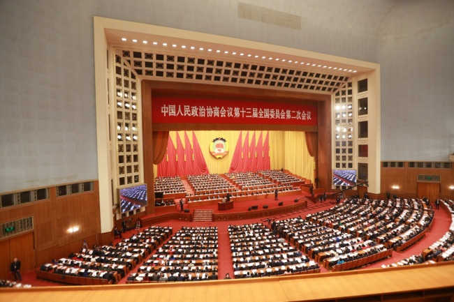 Delegates attend the opening meeting of the Second Session of the 13th National Committee of the CPPCC at the Great Hall of the People in Beijing, March 3, 2019. [Photo: IC]