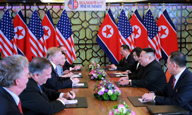 This picture from DPRK's official Korean Central News Agency (KCNA) taken on February 28, 2019 and released on March 1, 2019 shows DPRK’s leader Kim Jong Un (2nd R) meeting with US President Donald Trump (3rd L) at the Sofitel Legend Metropole hotel in Hanoi. [Photo: AFP/KCNA]