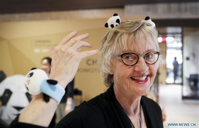 An attendee shows panda decorations she gets at an event promoting southwest China's city of Chengdu in the southern U.S. city of Austin, March 8, 2019. [Photo: Xinhua]