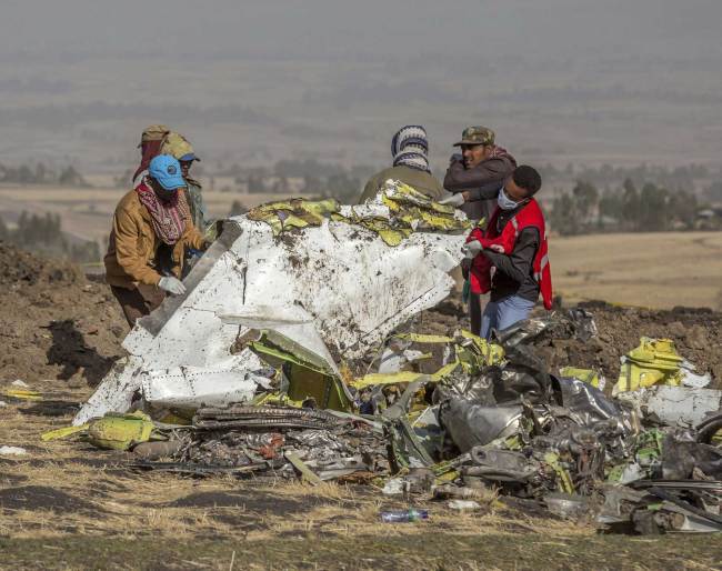 Rescuers work at the scene of an Ethiopian Airlines flight crash near Bishoftu, or Debre Zeit, south of Addis Ababa, Ethiopia, Monday, March 11, 2019. [Photo: AP]