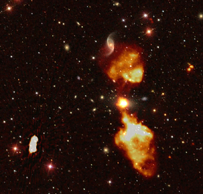 This handout released by Paris Observatory - PSL on February 19, 1919, shows an image taken with the Low-Frequency Array (LOFAR) radio telescope of a galaxy and its supermassive black hole ejecting jets of material, stacked on an optical image of the sky. [File Photo: AFP]