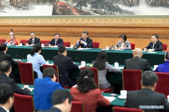 Chinese President Xi Jinping, also general secretary of the Communist Party of China Central Committee and chairman of the Central Military Commission, joins deliberation with deputies from Fujian Province at the second session of the 13th National People's Congress in Beijing, capital of China, March 10, 2019.[Photo:Xinhua]