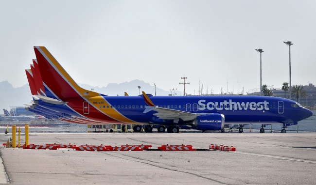 Boeing 737 Max jets are grounded at Sky Harbor International Airport, Thursday, March 14, 2019 in Phoenix. The U.S. issued an immediate emergency order Wednesday, grounding all 737 Max 8 and Max 9 aircraft in the wake of the crash of an Ethiopian Airliner. [Photo: IC]