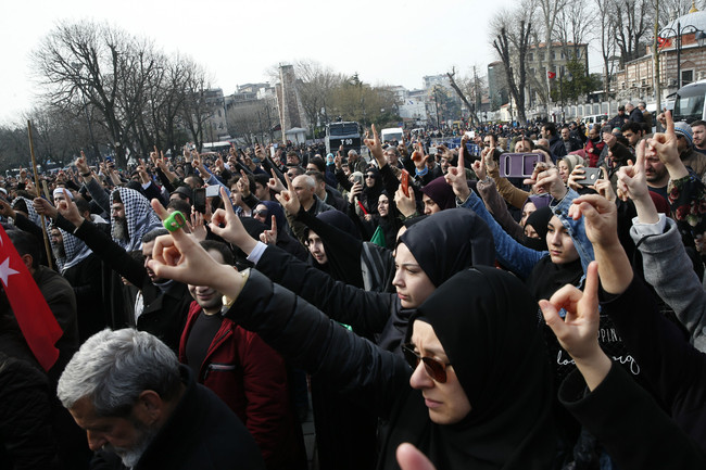 Demonstrators chant slogans against the mosque attacks in New Zealand during a protest in Istanbul, Saturday, March 16, 2019. World leaders expressed condolences and condemnation following the deadly attacks on mosques in the New Zealand city of Christchurch, while Muslim leaders said the mass shooting was evidence of a rising tide of violent anti-Islam sentiment. [Photo: AP/Lefteris Pitarakis]