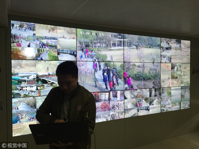 The monitor screen showing images from 31 high-resolution AI cameras installed around Yuyuantan Park, Beijing, March 18, 2019. [Photo: VCG]