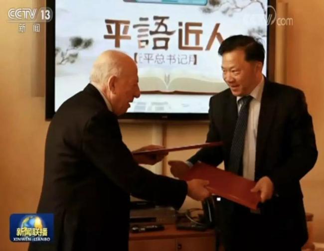 Shen Haixiong, President of China Media Group, and Fedele Confalonieri, Chairman of Mediaset, sign a memorandum of understanding in Rome on March 21, 2019. [Photo: China Plus]