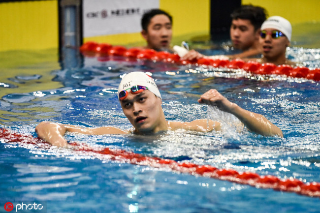Sun Yang celebrates after winning men's 400m freestyle at the National Swimming Championships in Qingdao on Mar 25, 2019. [Photo: IC]