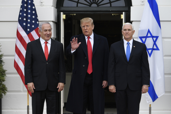 U.S. President Donald Trump and Vice President Mike Pence, greet Israeli Prime Minister Benjamin Netanyahu to the South Lawn of the White House in Washington, Monday, March 25, 2019. [Photo: AP/Susan Walsh]