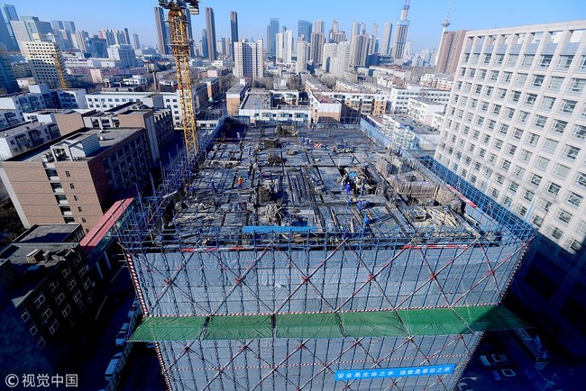 A building is under construction in Shenyang, Liaoning Province. [File Photo: VCG]