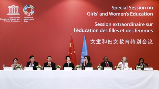 Peng Liyuan(4th L), wife of Chinese President Xi Jinping, and UNESCO special envoy for the advancement of girls' and women's education, attends the special session on girls' and women's education in Paris, France, March 26, 2019. (Photo: Xinhua/Ding Lin)