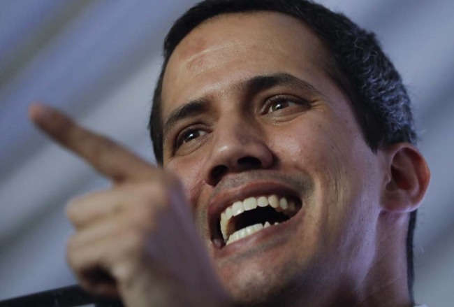 Venezuela's self-proclaimed interim president Juan Guaido talks during a meeting with electricity experts in Caracas, Venezuela, Thursday, March 28, 2019. The Venezuelan government on Thursday said it has barred Guaido from holding public office for 15 years, though the National Assembly leader responded soon afterward that he would continue his campaign to oust President Nicolas Maduro. [Photo: AP]