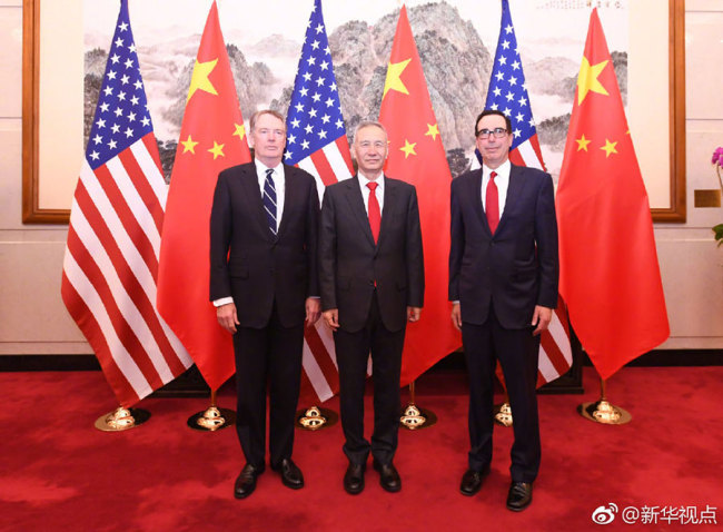 China’s lead negotiator Vice Premier Liu He and, U.S. Trade Representative Robert Lighthizer (left), and U.S. Treasury Secretary Steven Mnuchin participate in a new round of high-level economic and trade consultations in Beijing on Friday, March 29, 2019. [Photo: Xinhua]