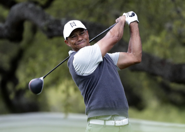 Tiger Woods watches his drive on the eighth hole during fourth round play at the Dell Technologies Match Play Championship golf tournament, Saturday, March 30, 2019, in Austin, Texas. [Photo: AP/Eric Gay] 
