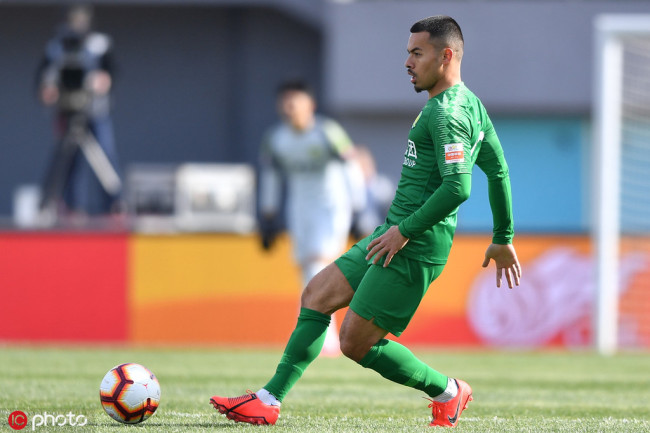 Nico Yennaris, known in China as Li Ke, with the Beijing Guo'an Football Club, takes on Beijing Renhe in their 3rd round match during the 2019 Chinese Football Association Super League (CSL) in Beijing, China, March 30, 2019. [Photo: IC]