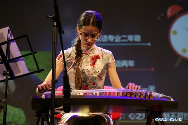 A contestant performs during the "Chinese Bridge" competition in Bucharest, Romania, on April 2, 2019. [Photo: Xinhua]