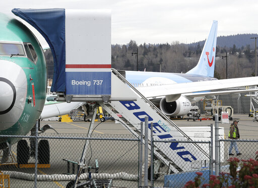 In this Monday, March 11, 2019 file photo, a Boeing 737 MAX 8 airplane being built for TUI Group sits parked in the background at right at Boeing Co.'s Renton Assembly Plant in Renton, Wash.[File photo: AP]