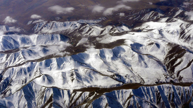 Snow mountains in China's Xinjiang Uygur Autonomous Region [File Photo: IC]