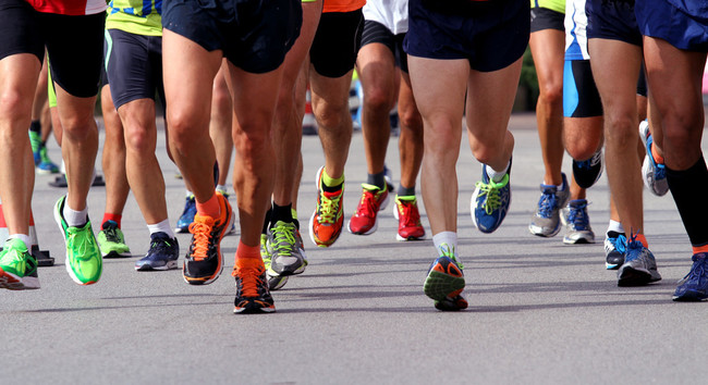 Many runners race to the finish line of marathon. [Photo: IC]