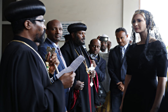 White House senior adviser Ivanka Trump, right, is greeted as she arrives for a ceremony at Holy Trinity Cathedral honoring the victims of the Ethiopian Airlines crash, Monday April 15, 2019, in Addis Ababa, Ethiopia. [Photo: AP/Jacquelyn Martin]