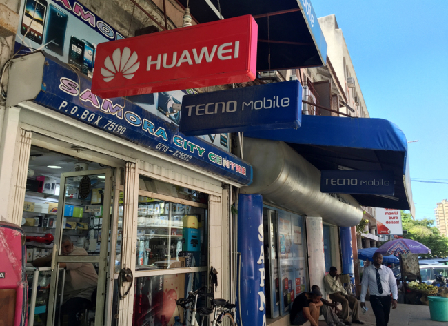 A Tecno store stands side by side with a retailer of Huawei in Dar es Salaam, Tazania in this photo taken on March 10, 2016. [Photo: China Plus]