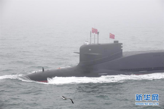 A nuclear submarine of the People's Liberation Army (PLA) Navy in a naval parade staged to mark the 70th founding anniversary of the PLA Navy on the sea off Qingdao, Shandong Province on Tuesday, April 23, 2019 [Photo: Xinhua]