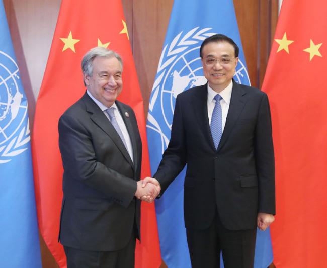 Chinese Premier Li Keqiang meets with United Nations Secretary-General Antonio Guterres in Beijing on Friday, April 26, 2019. [Photo: Gov.cn] 