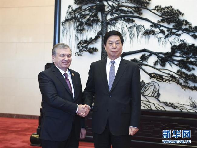 Chinese top legislator Li Zhanshu meets with Uzbek President Shavkat Mirziyoyev, who is attending the Second Belt and Road Forum for International Cooperation in Beijing, April 26, 2019. [Photo: Xinhua]