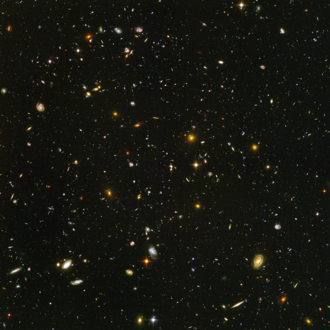 This image made from a composite of September 2003 - January 2004 photos captured by the NASA/ESA Hubble Space Telescope shows nearly 10,000 galaxies in the deepest visible-light image of the cosmos, cutting across billions of light-years. [Photo: AP]