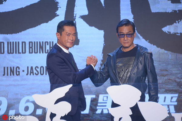Hong Kong actor Louis Koo (L) and actor Tony Leung Ka Fai attend a press conference announcing the release of a sequel to Hong Kong Film Awards winner "Chasing the Dragon" on April 28, 2019. [Photo: Imagine China]